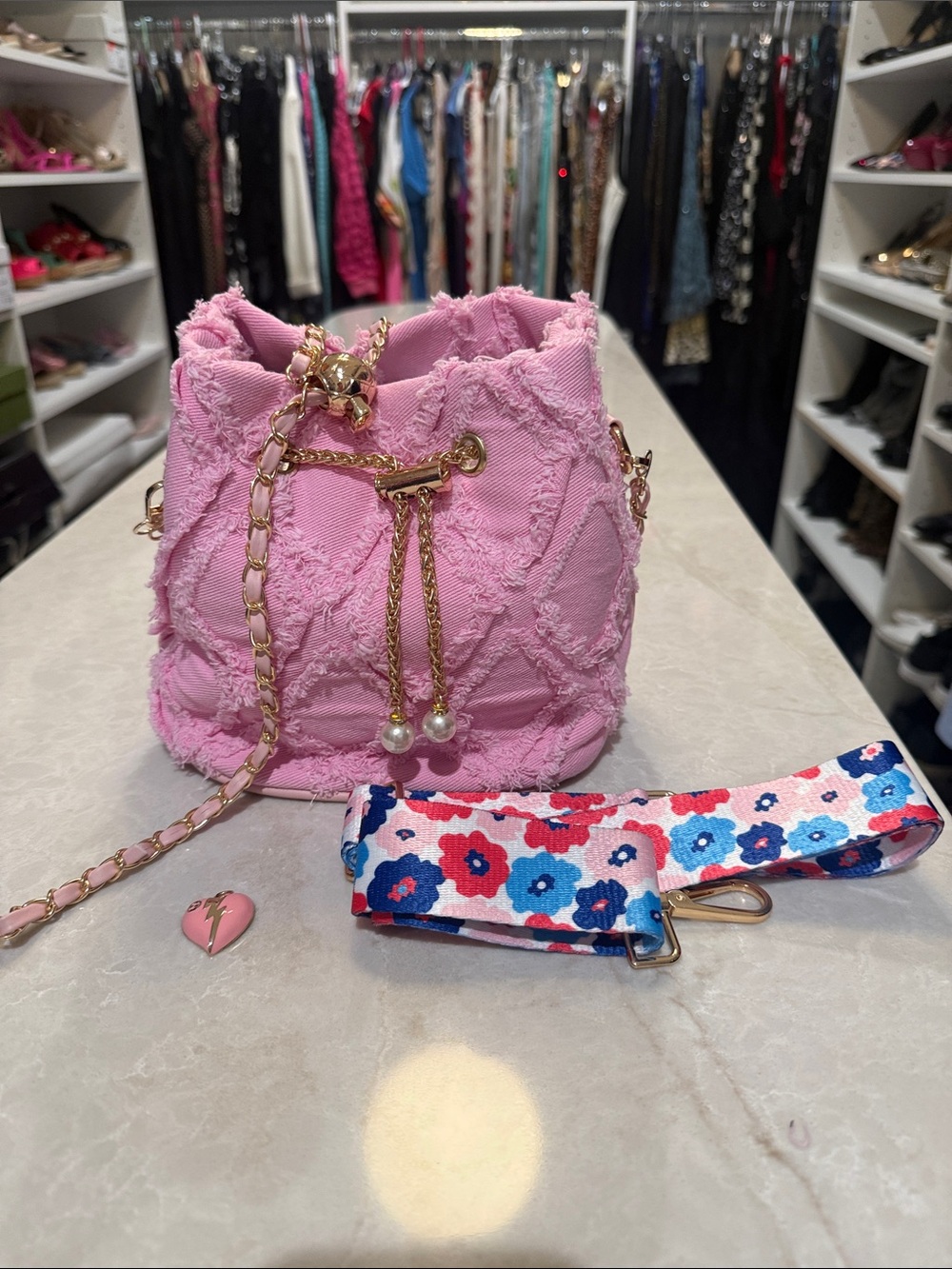Bundle of denim  pink crossbody bag with skin care or charm and strap  New!!